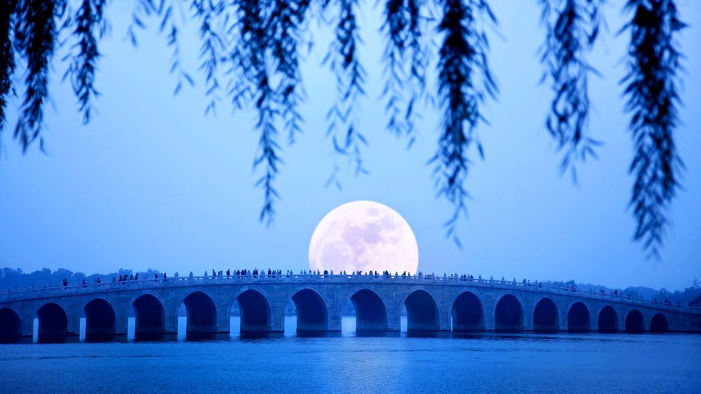Summer Palace Beijing moonlit bridge across Kunming Lake
